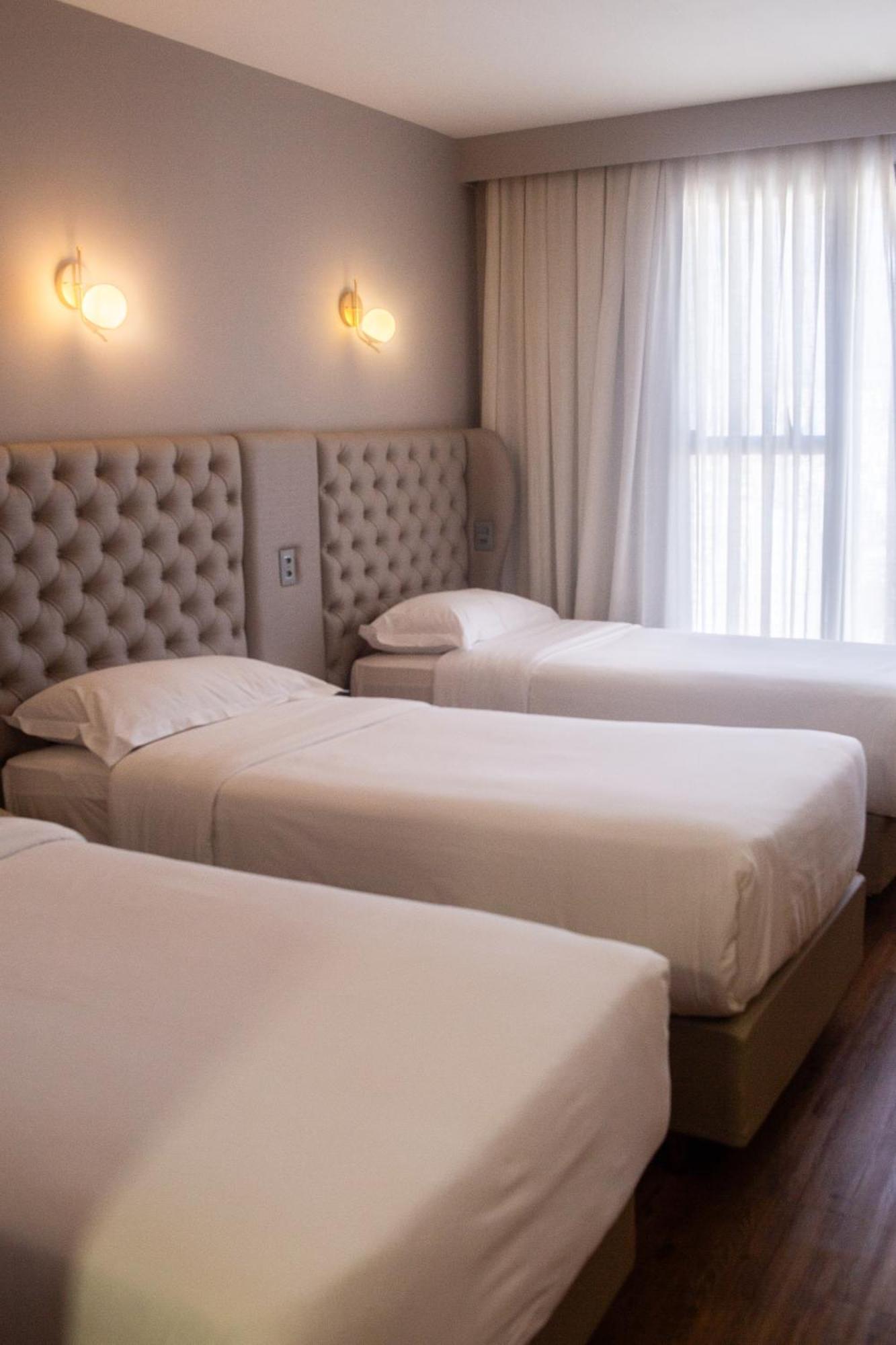 Ouro Minas Hotel Belo Horizonte, Dolce By Wyndham 외부 사진 A room at the hotel